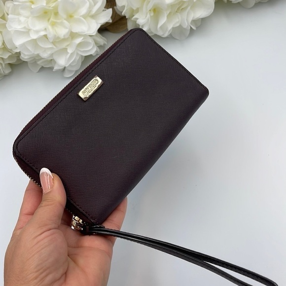 kate spade Handbags - Kate Spade Leather Wristlet Burgundy